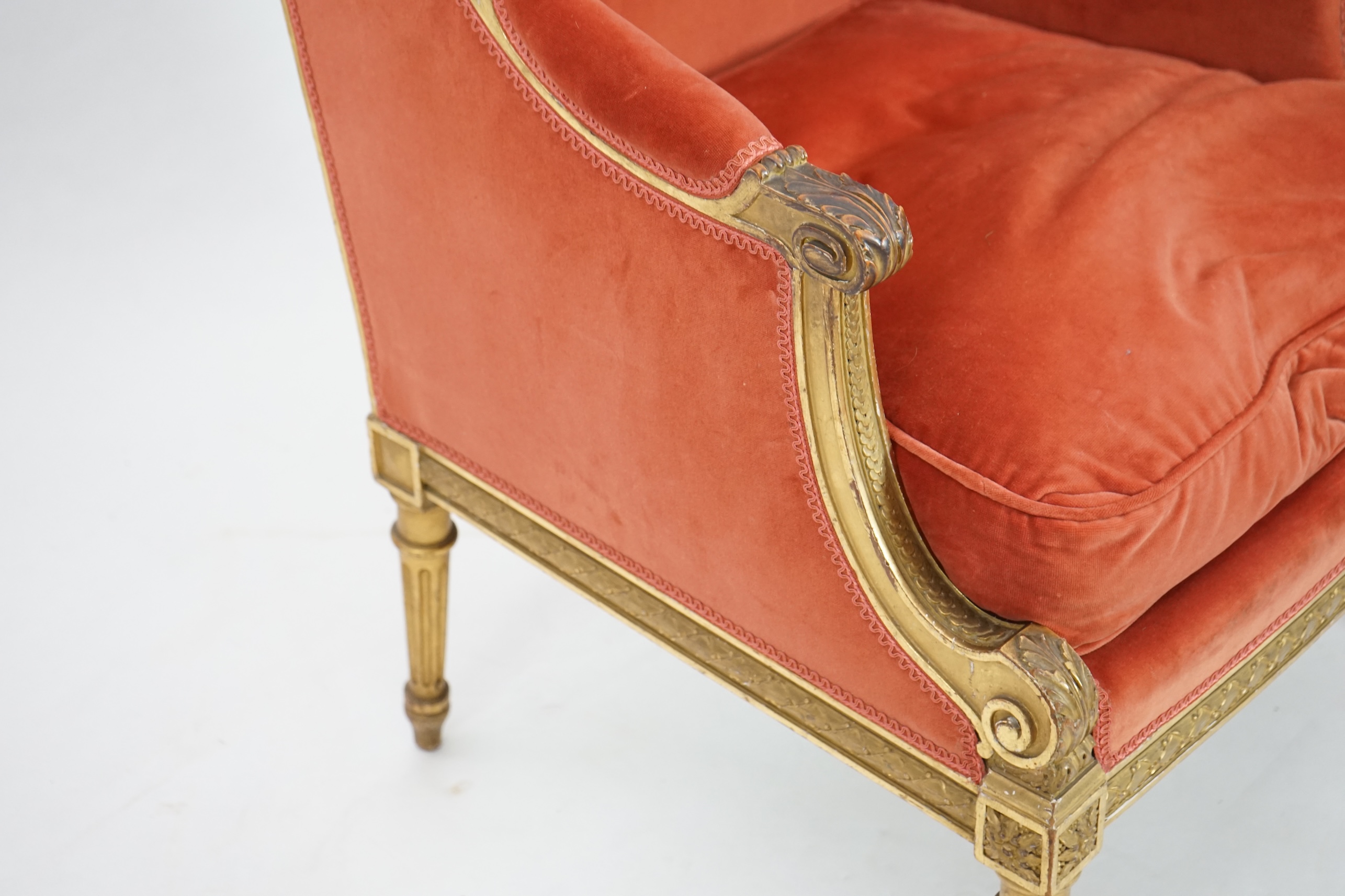 A Louis XVI style carved giltwood fauteuil, circa 1900